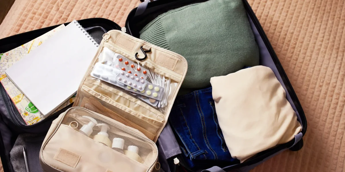 an-open-suitcase-with-a-travel-set-of-cosmetics-an-2026-01-09-10-26-49-utc